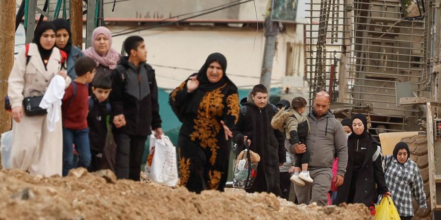 مئات الفلسطينيين يغادرون مخيم جنين - أرض المملكة